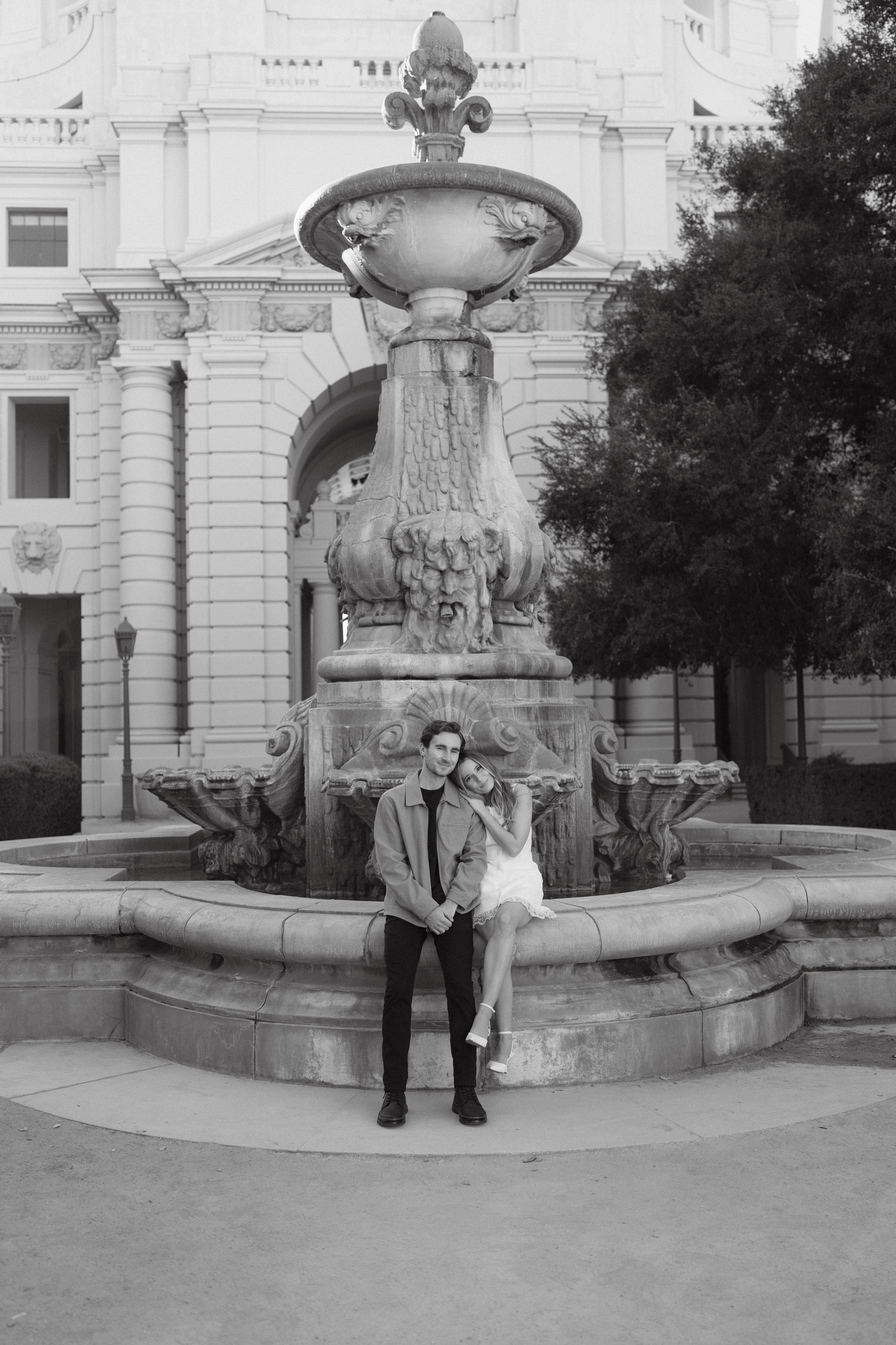 Black-and-white portrait by the fountain