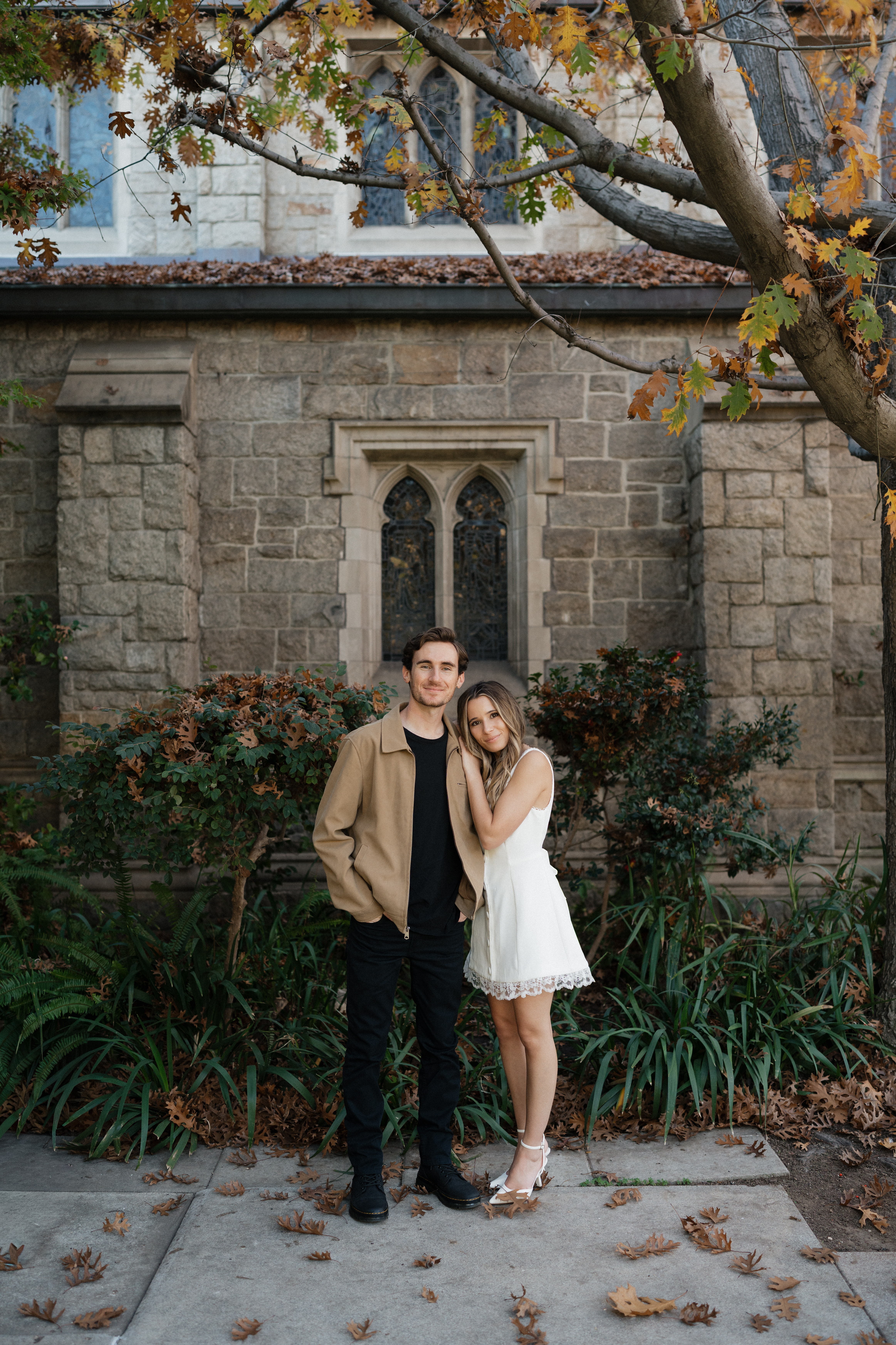 Standing under autumn branches